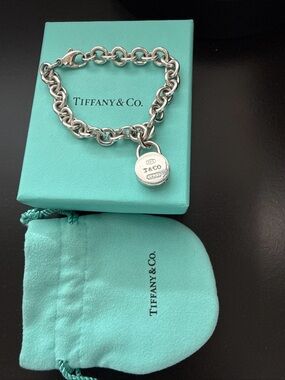 Tiffany & Co. Silver Charm Link Bracelet with Round Tag